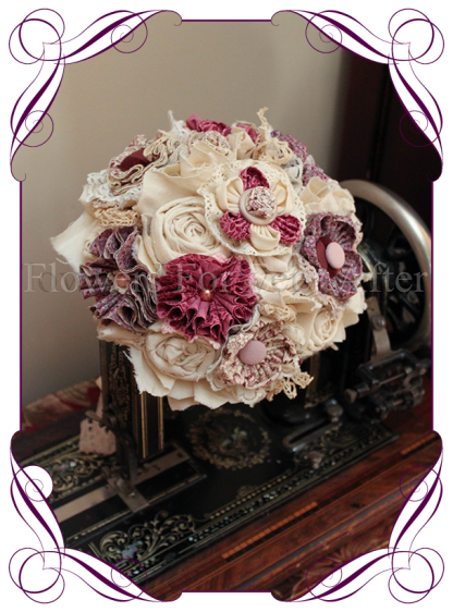 Vintage glamour, temperance bridesmaid bouquet, this design is made entirely with fabric and handmade flowers. With laces, crystals and pearls throughout, the brooch bouquet, bling bouquet, country style rustic bridal bouquet in fabric flowers. Dusty pink and cream with buttons and lace
