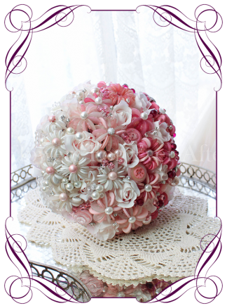 A beautiful button flower bridal bouquet with hombre design featuring our uniquely designed button flowers, pearls and beads.