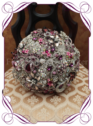 A unique and glamorous Gatsby style vintage bouquet. A large 9 inch brooch bouquet in silvers, crystals and purples.