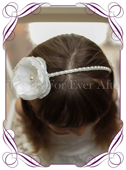 A sweet girls flower and pearl headband perfect for communions, confirmation and flower girls hair styles.