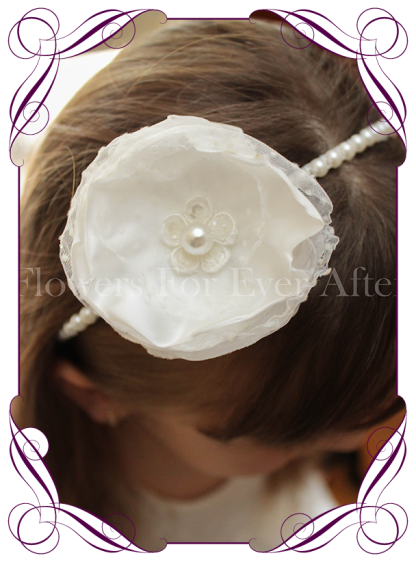 A sweet girls flower and pearl headband perfect for communions, confirmation and flower girls hair styles.