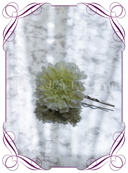 Cream silk artificial hair flower on pin.