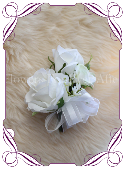 Classic white silk artificial ladies wedding formal corsage with white roses and babys breath
