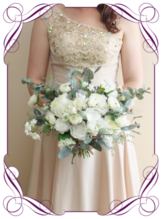 A romantic Silk Artificial Bridal Bouquet posy, featuring faux flower white ivory roses, peonies, silver blue gum and textures in a classic bridal style, pink wedding flowers, traditional wedding bouquets. Made in Melbourne by Australia's Best Artificial Bridal Florist. Worldwide Shipping available