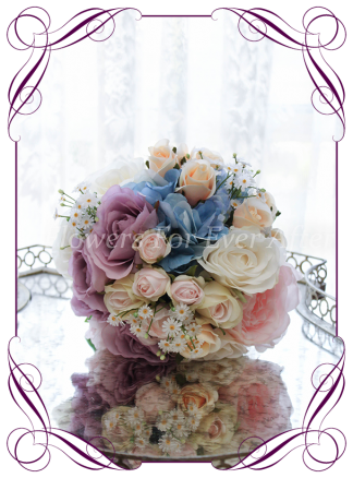 Silk Artificial Bridesmaids posy bouquet featuring faux flower blue hydrangea and roses in a classical style and pastel tones. Made in Melbourne, worldwide shipping available