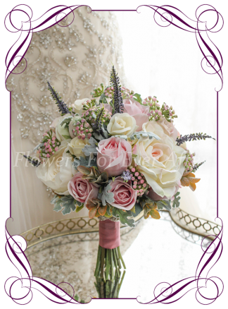 Silk faux flower bridal Bouquet, brides bouquet featuring silk roses in blush tones with textures in a classical style. Made in melbourne by Australia's best silk wedding florist. World wide shipping