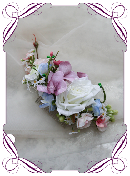 Silk Artificial floral bridal hair comb featuring faux flower powder blue pinks and purples with crystals. Made in Melbourne by Australia's best Silk Florist, worldwide shipping available