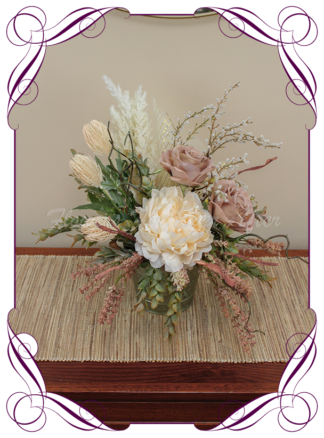 silk artificial gift arrangement in a rustic tin vase. Cream peony, pampas grass, dusty pink roses, white wattle, Australian native flowers and blue gum Australian native gum leaves. Buy on line , shipping world wide from Australians best florist online