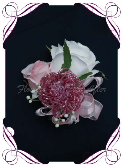 silk artificial ladies pinned or wrist corsage for wedding and formal / prom. Blush pink rose bud ivory white rose bud baby's breath with rose pink beaded bling accent flower. Made in Melbourne Australia. Buy online, shipping world wide.