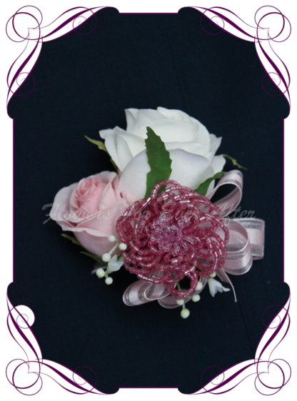 silk artificial ladies pinned or wrist corsage for wedding and formal / prom. Blush pink rose bud ivory white rose bud baby's breath with rose pink beaded bling accent flower. Made in Melbourne Australia. Buy online, shipping world wide.