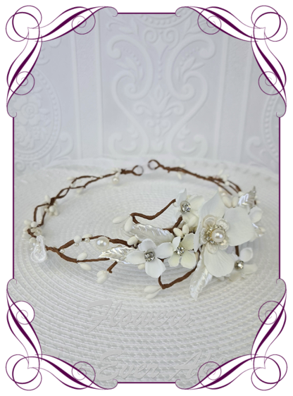 Silk artificial all white with pearls and bling crystals floral hair crown halo. Ideal for wedding, Communion, Confirmation hair decoration. Made in Melbourne Australia. Buy online. Ships worldwide.