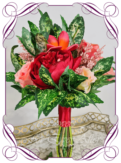 Vibrant bright tropical colours in faux artificial bridesmaid posy bouquet.