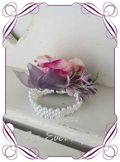 Silk artificial elegant pink and plum purple rose wrist corsage on pearls for wedding prom formal. Unusual wedding flowers, unusual corsage flower, mother of the bride flowers, mother of the groom flowers. Made in Melbourne by Australia's best silk florist. Buy online. Shipping worldwide