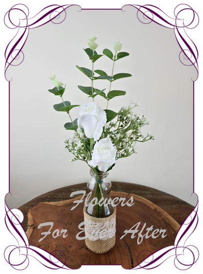 Silk artificial white roses and baby's breath and eucalypt gum bunch cluster table centrepiece decoration. Wedding table florals. simple white wedding rustic table centrepiece. Made in Australia. Buy online. Shipping world wide