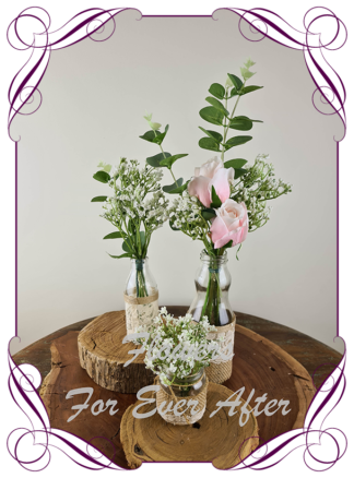 Silk artificial blush pink roses and baby's breath and eucalypt gum bunch cluster table centrepiece decoration. Wedding table florals. simple white wedding rustic table centrepiece. Made in Australia. Buy online. Shipping world wide