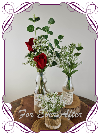 Silk artificial red roses and baby's breath and eucalypt gum bunch cluster table centrepiece decoration. Wedding table florals. simple white wedding rustic table centrepiece. Made in Australia. Buy online. Shipping world wide