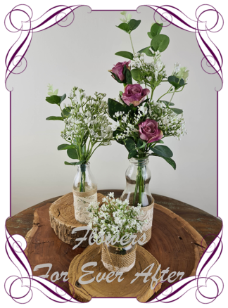 Silk artificial dusty rose pink roses and baby's breath and eucalypt gum bunch cluster table centrepiece decoration. Wedding table florals. simple white wedding rustic table centrepiece. Made in Australia. Buy online. Shipping world wide