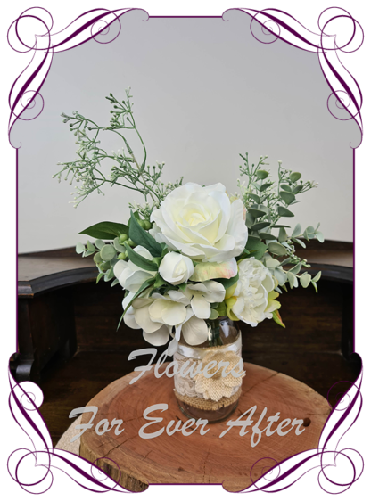 Silk artificial white and sage table centrepiece decoration. Wedding table florals. simple wedding rustic table centrepiece with white roses, peonies, blue gum, sage leaves. Australian native gum leaves. Made in Australia. Buy online. Shipping world wide