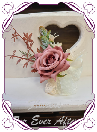 silk artificial ladies corsage for wedding and formal / prom. Dusty pink rose bud with dusty brown pink. Rose gold suited. Made in Melbourne Australia. Buy online, shipping world wide.