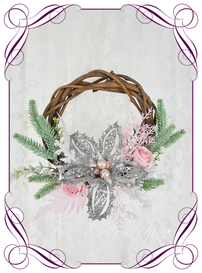 Pink White Artificial floral mini Christmas wreath for door or wall, featuring artificial florals. Made by Melbourne’s Best Silk Bridal Florist creating unique artificial wedding flower packages. Delivery worldwide. Custom orders welcome.