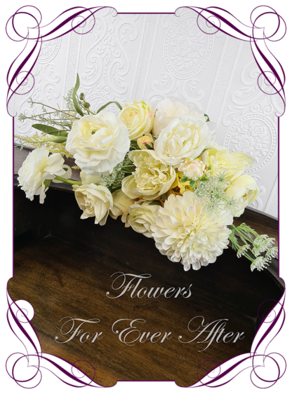Silk artificial wedding bouquet ideas. Mixed soft pastel yellow and cream white faux silk bridal bouquet wedding posy set flowers. Roses, orchid, dahlia, ranunculus, peonies. Elegant romantic wedding posy bouquet. Made in Melbourne. Buy online. Shipping worldwide.