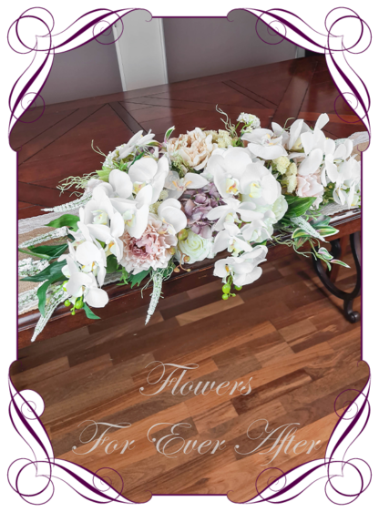Silk artificial romantic bridal table centrepiece arrangement nude champagne blush pink mauve peonies moth phalaenopsis orchids. Roses and orchid bridal wedding table arrangement centrepiece flowers. Realistic fake wedding flowers. Made in Melbourne Australia. Buy online..