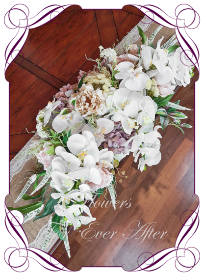 Silk artificial romantic bridal table centrepiece arrangement nude champagne blush pink mauve peonies moth phalaenopsis orchids. Roses and orchid bridal wedding table arrangement centrepiece flowers. Realistic fake wedding flowers. Made in Melbourne Australia. Buy online..