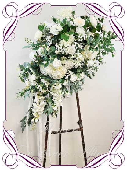 Silk artificial large arbor wedding decoration florals. Large flower arrangement for wedding arbor arch background. Bridal white peonies roses and baby's breath silk flowers. Made in Melbourne. Buy online. Arbor flowers.