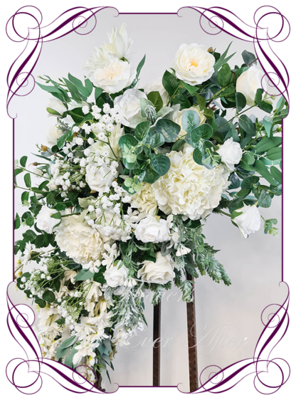 Silk artificial large arbor wedding decoration florals. Large flower arrangement for wedding arbor arch background. Bridal white peonies roses and baby's breath silk flowers. Made in Melbourne. Buy online. Arbor flowers.