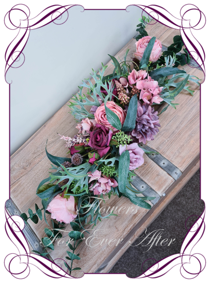 Silk artificial pink and purple arbor, bridal table, centrepiece, sign or pew decoration for wedding commitment ceremony. Silk flower centrepieces. Buy Online. Shipping world wide by Australia's best bridal florist.