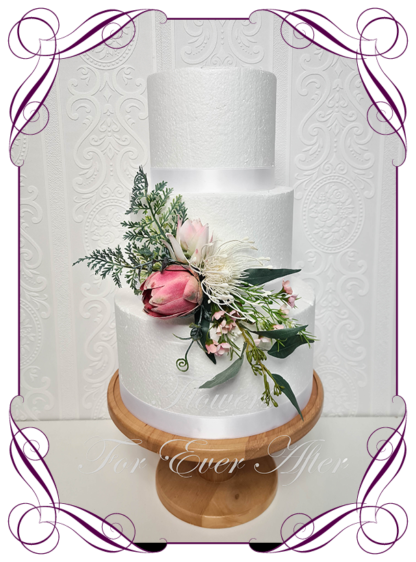 Silk artificial wedding engagement birthday cake flowers decoration. Native Australian white and pink protea unique unusual floral cake design. Made in Melbourne. Buy online