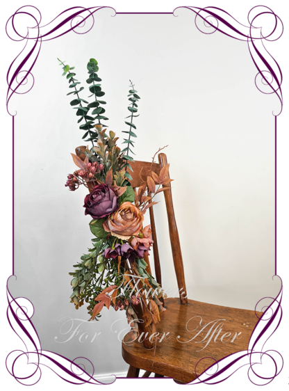 Silk artificial burnt amber orange and dark purple arbor, bridal table, centrepiece, sign or pew decoration for wedding commitment ceremony. Silk flower centrepieces. Buy Online. Shipping world wide by Australia's best bridal florist.