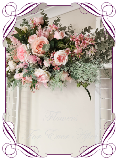 Silk artificial pink and sage wedding flowers wedding arbor arch background decoration. Roses and peonies wedding ceremony silk wedding florals, unusual romantic realistic fake wedding decoration design. Bridal table centrepiece flowers. Made in Melbourne Australia. Buy online..