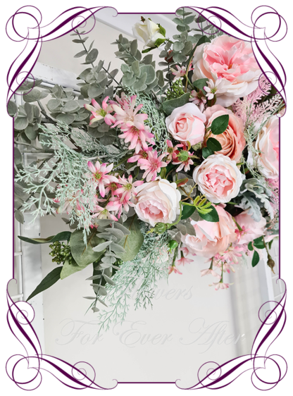 Silk artificial pink and sage wedding flowers wedding arbor arch background decoration. Roses and peonies wedding ceremony silk wedding florals, unusual romantic realistic fake wedding decoration design. Bridal table centrepiece flowers. Made in Melbourne Australia. Buy online..