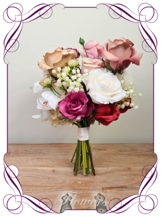 Silk artificial Colourful modern luxe bridal bouquet wedding flowers. Roses and orchids, pink blush red magenta white. Made in Melbourne. Buy online. Shipping worldwide. Wedding bouquet ideas.