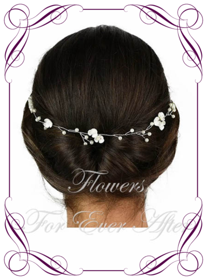 Pearl dainty flowers on silver bridal hair design vine, long length for soft bridal curls or braids. Wedding hair design ideas. Buy online, shipping world wide.