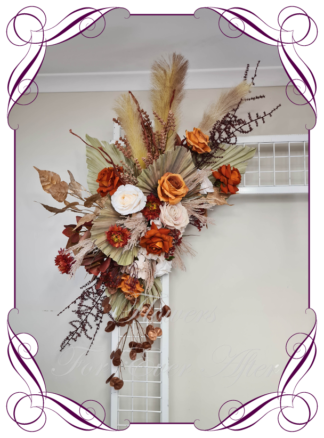 Silk artificial rust burnt orange cream and brown harvest rustic autumn fall arbor, bridal table, centrepiece, sign or pew decoration for wedding commitment ceremony. Silk flower centrepieces. Buy Online. Shipping world wide by Australia's best bridal florist.