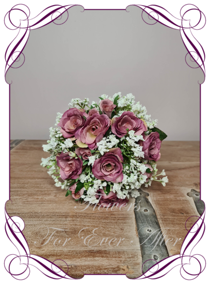 Silk artificial simple flower girl posy bouquet with dusty mauve pink roses and baby's breath gyp. Buy online. Shipping world wide