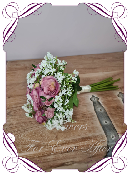 Silk artificial simple flower girl posy bouquet with dusty mauve pink roses and baby's breath gyp. Buy online. Shipping world wide