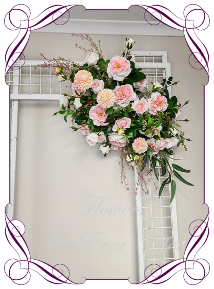 Silk artificial ceremony florals in pink white and cream wedding flowers wedding arbor arch background decoration. Roses and peonies wedding ceremony silk wedding florals, unusual romantic realistic fake wedding decoration design. Bridal table centrepiece flowers. Made in Melbourne Australia. Buy online..