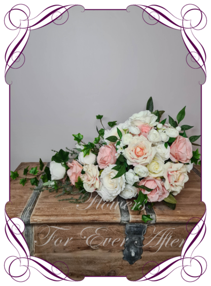 Silk artificial romantic classic elegant bridal tear bouquet in peach pink and white bridal flowers. Made in Melbourne Australia by Australia's best silk florist. Buy online. Shipping worldwide. Lux wedding florals. Luxe wedding flowers. Cheap wedding bouquets.