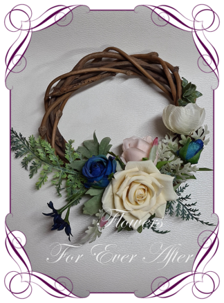 Artificial floral mini Christmas wreath for door or wall, featuring artificial florals. Made by Melbourne’s Best Silk Bridal Florist creating unique artificial wedding flower packages. Delivery worldwide. Custom orders welcome.