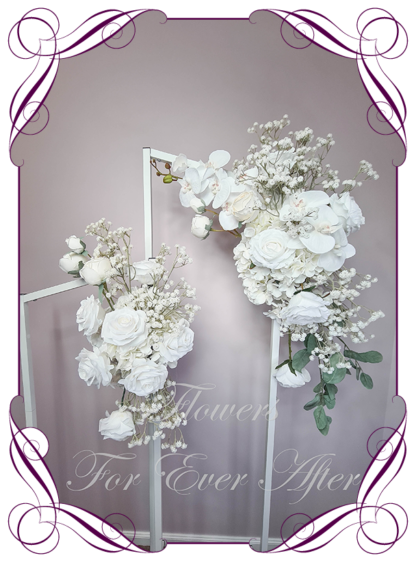 Wedding arbor ceremony flowers, artificial flower décor all white modern, luxe, romantic, wedding ceremony flowers, wedding arbor arch background decoration. Silk orchid and white roses silk wedding florals, unusual romantic realistic fake wedding decoration design. Made in Melbourne Australia. Buy online..