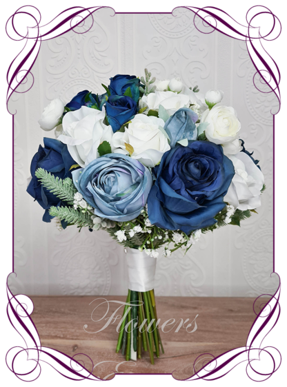 Silk artificial wedding bouquet ideas. Mixed ivory white navy, dusty light blue faux silk bridal bouquet wedding flowers. Roses, peonies, ranunculus, baby's breath, eucalypt gum leaves foliage. Elegant romantic wedding posy bouquet. Made in Melbourne. Buy online. Shipping worldwide.