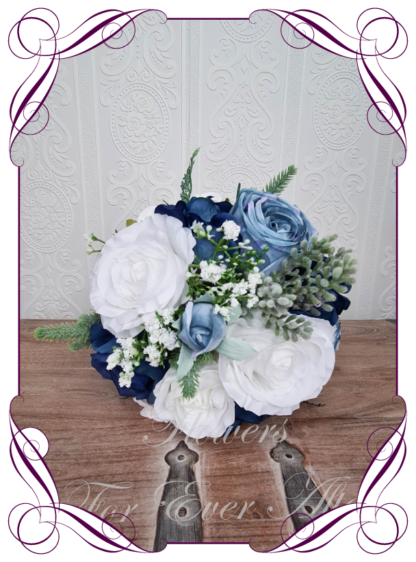Silk artificial wedding bouquet ideas. Mixed ivory white navy, dusty light blue faux silk bridal bouquet wedding flowers. Roses, peonies, ranunculus, baby's breath, eucalypt gum leaves foliage. Elegant romantic wedding posy bouquet. Made in Melbourne. Buy online. Shipping worldwide.