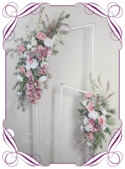 Wedding ceremony artificial flower décor for arbors, backdrop flowers. Featuring faux flowers in dusty pink, white and Australian native foliage. Silk orchids and roses in a classy arbor decoration for easy set up. Arbor flower décor set. Made in Melbourne Australia. Buy Online Now.