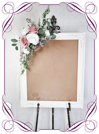 Wedding sign flowers featuring faux dusty pink and white roses and Australian native foliage. Wedding flower packages made in Melbourne Australia. Buy online now.