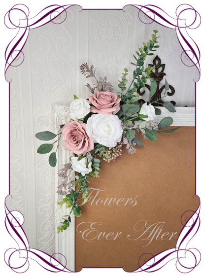 Wedding sign flowers featuring faux dusty pink and white roses and Australian native foliage. Wedding flower packages made in Melbourne Australia. Buy online now.