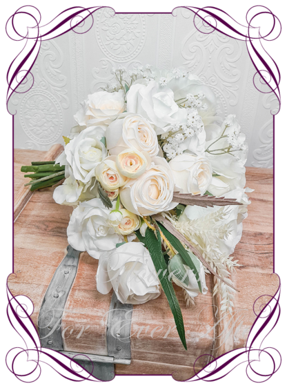 Artificial brides flowers in champagne cream and white faux roses natives. Silk Bridal Bouquet posy, featuring faux flowers Australian native foliage in a romantic elegant and unusual bridal style, classic white and cream wedding flowers, modern, luxe, traditional wedding bouquets. Made in Melbourne by Australia's Best Artificial Bridal Florist. Worldwide Shipping available