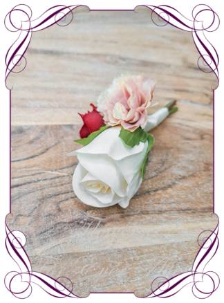 Groomsman wedding flower in faux blush champagne and red. Silk artificial gents wedding formal button boutonniere with roses and cream foliage. Made in Melbourne Australia. Buy online now.